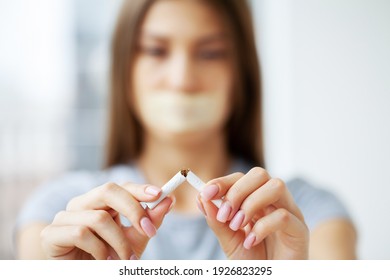 Stop Smoking, Woman Holding A Broken Cigarette