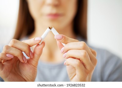 Stop Smoking, Woman Holding A Broken Cigarette