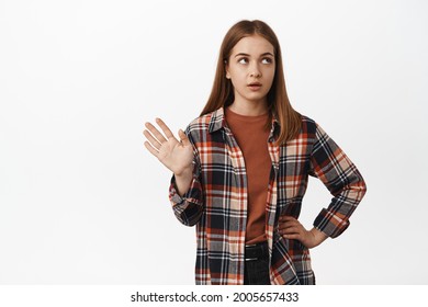 Stop, Thats Anough, Dont Want Hear. Reluctant Girl Waves Hand And Rolls Eyes From Annoyance, Being Uninterested Or Bored, Quit Talking, Unwilling To Speak Or Continue Conversation, White Background