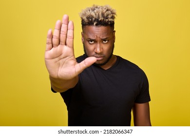 Stop, There Is No Road Here, - The Dark-skinned Guy Looks From Under His Brows And Shows Stopping Gesture With His Hand. I Don't Want To Listen To This Nonsense Anymore, Man Shows All His Indignation