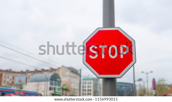 stop traffic sign on city\
background
