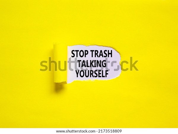 Stop trash\
talking yourself symbol. Concept words Stop trash talking yourself\
on a beautiful yellow background. Psychological and stop trash\
talking yourself concept. Copy\
space.