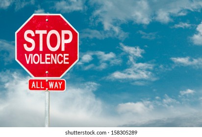 Stop Violence creative sign on a sky background