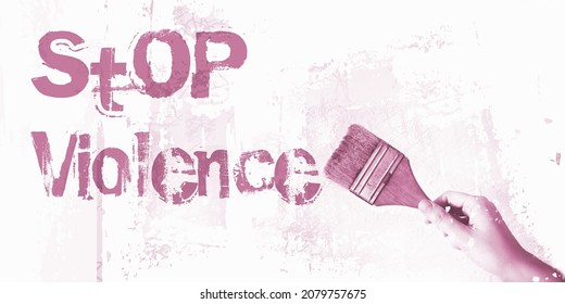 Stop Violence words on wall ,paintbrush. Domestic abuse prevention concept