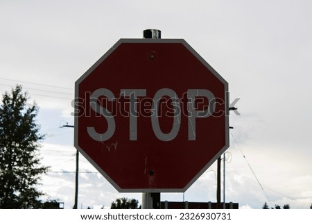 Stopsign in overcast cloudy day
