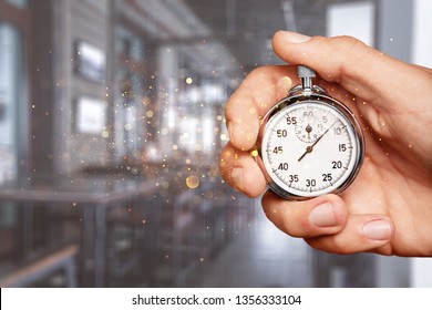 Stopwatch in Human Hand - Shutterstock ID 1356333104