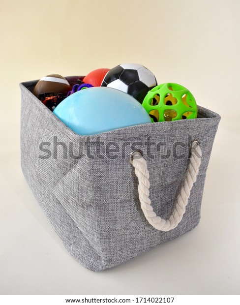 Storage basket for
organization and accessibility of children's and family sports
equipment and games