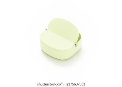 Storage Box Isolated On White Background. Green Tiny Storage Box. Minimalist Object. Scandinavian Style. Home Decoration. Simplicity. Household Items. Home Organization Products. Steel Material.