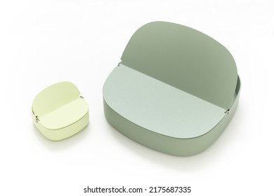 Storage Box Isolated On White Background. Green Tiny Storage Box. Minimalist Object. Scandinavian Style. Home Decoration. Simplicity. Household Items. Home Organization Products. Steel Material.