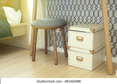 Storage Boxes And  Wood Chair In Room