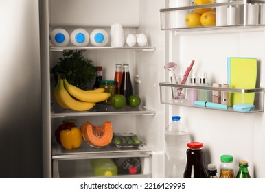 Storage Of Cosmetics In Refrigerator Door Bin Next To Groceries