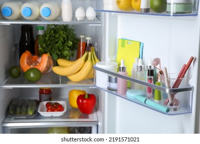 Storage Of Cosmetics And Tools In Refrigerator Door Bin Next To Groceries