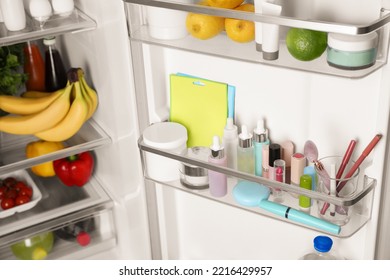 Storage Of Cosmetics And Tools In Refrigerator Door Bins Next To Groceries