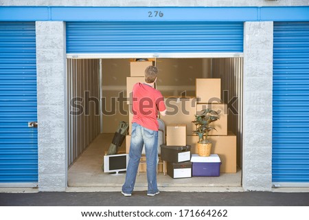 Storage: Man Finished Putting Stuff In Storage