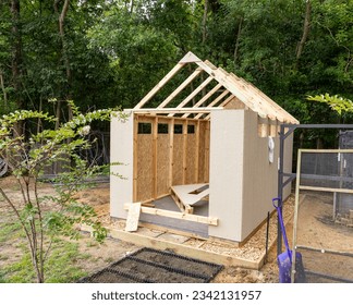 Storage shed being built in back yard