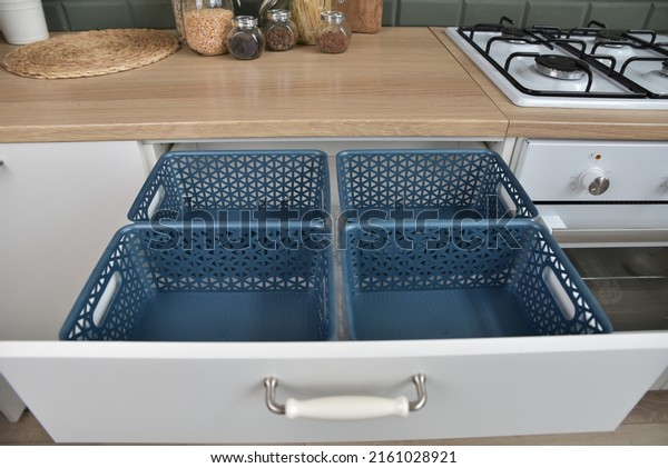 Storage system in the kitchen. Plastic containers\
for storing various\
items