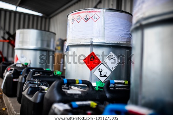 The storage of toxic waste and chemicals in metal\
cans on the factory premises of a chemical plant / Toxic waste\
chemical plant