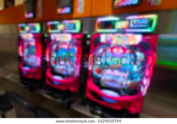 Store image\
lined with pachinko machines in\
Asia
