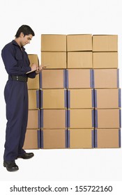 Store manager checking inventory