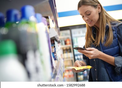 Store Manager Controlling Stocks On Shelves