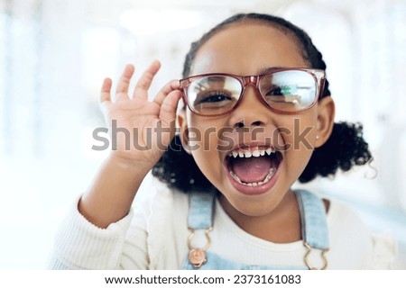 Store, portrait and child excited for eyeglasses, lens frame and scream for optical eyewear, ocular wellness or optometry service. Happy energy, vision support or young kid girl with eye care glasses Foto d'archivio © 