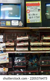 Store Shelves With Old Video Games. Vertical. Tokyo, Japan, 04-04-2017.