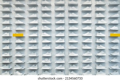 Store Wall With White Sneakers.