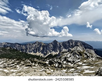 Storm cloud over mountain range, Triglav National Park, Slovenia