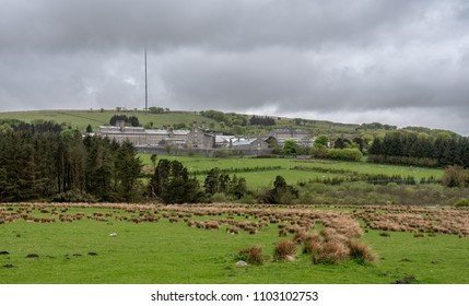 Storm Clouds Above The Granite Walls And Buildings Of HM Prison Dartmoor