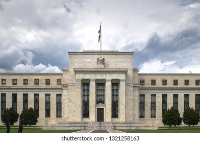 Storm Clouds Behind The Exterior Of The Federal Reserve Building