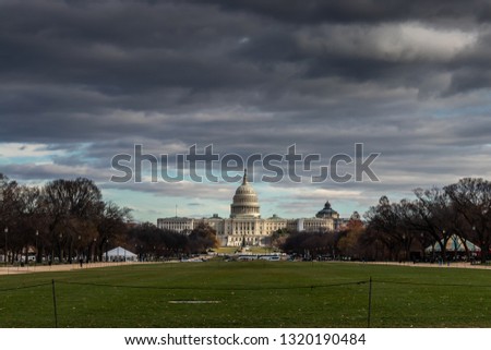Similar – Image, Stock Photo Dramatic storm over Monument Valley road