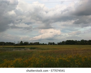 storm clouds over field