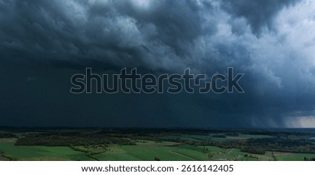 Storm clouds over field, tornadic supercell, extreme weather, dangerous storm, climate change 20