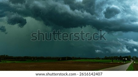 Storm clouds over field, tornadic supercell, extreme weather, dangerous storm, climate change 20