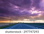 Storm clouds over highway