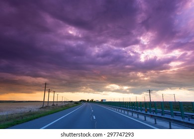 Storm clouds over highway