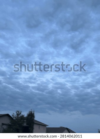 Storm Clouds Over Open Landscape Before Rainfall