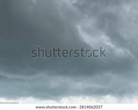 Storm Clouds Over Open Landscape Before Rainfall