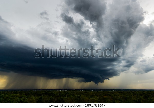 Storm clouds with the rain. Nature\
Environment Dark huge cloud sky black stormy\
cloud