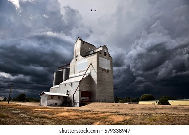 Storm Clouds Saskatchewan Grain Elevator In Canada