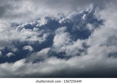 Storm clouds with strong contrasts between dark and light