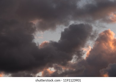 Storm clouds in the sunset light