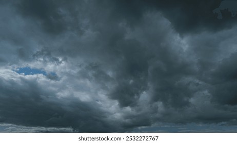 Storm Cloudy Cloudscape. Rainy Dark Blue Cumulus Clouds. Cloud Changing Shape On Gray Cloudy Sky.