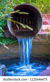 Storm Drain Flowing With Water