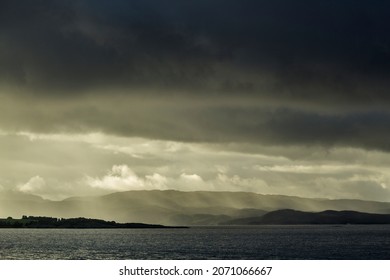 Storm In A Fjord Norway. Rain And Sun. Every Cloud Has A Silver Lining