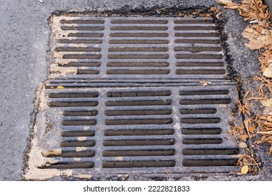 Storm Grate, Drainage. Background With Selective Focus And Copy Space For Text