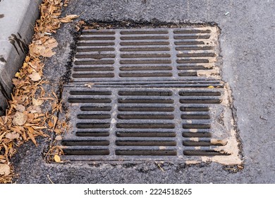 Storm Grate, Drainage. Background With Selective Focus And Copy Space For Text