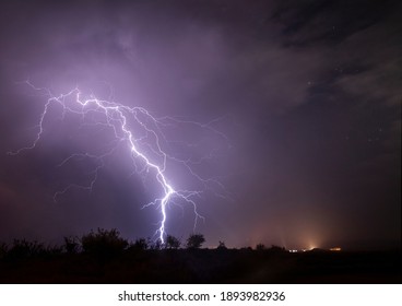 storm lightning over fields of spain

