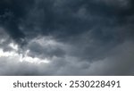 Storm and rain clouds. Under cumulonimbus asperitas with some stratus. Some points is translucent. Ant eye view.