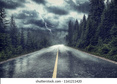 Storm With Rain And Lightning On The Street